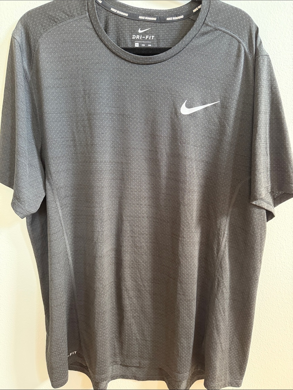Nike Dri-FIT Short Sleeve Tee in Dark Gray with White Swoosh